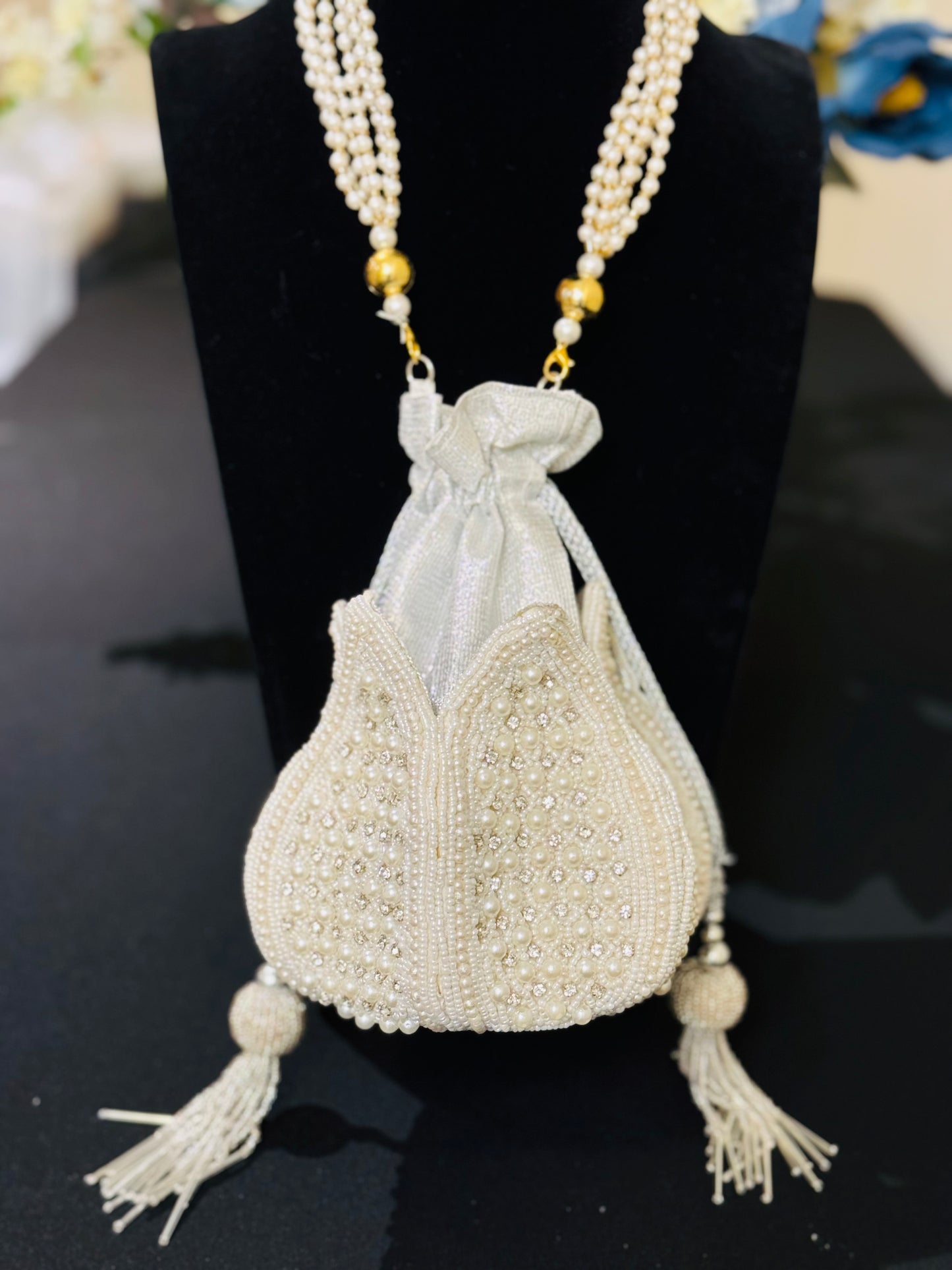 Beautiful white pearl work handmade Potli bag for any occasion