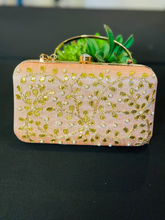 Beautiful baby pink Clutch with Gotta pati work for weddings and parties