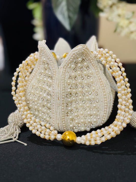 Beautiful white pearl work handmade Potli bag for any occasion