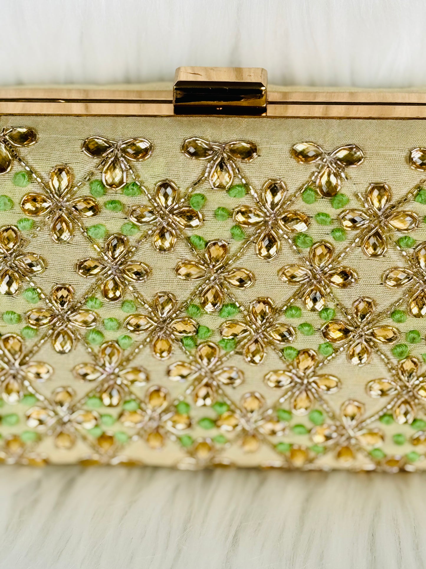 Beautiful embroidery handwork clutch in golden Clutch