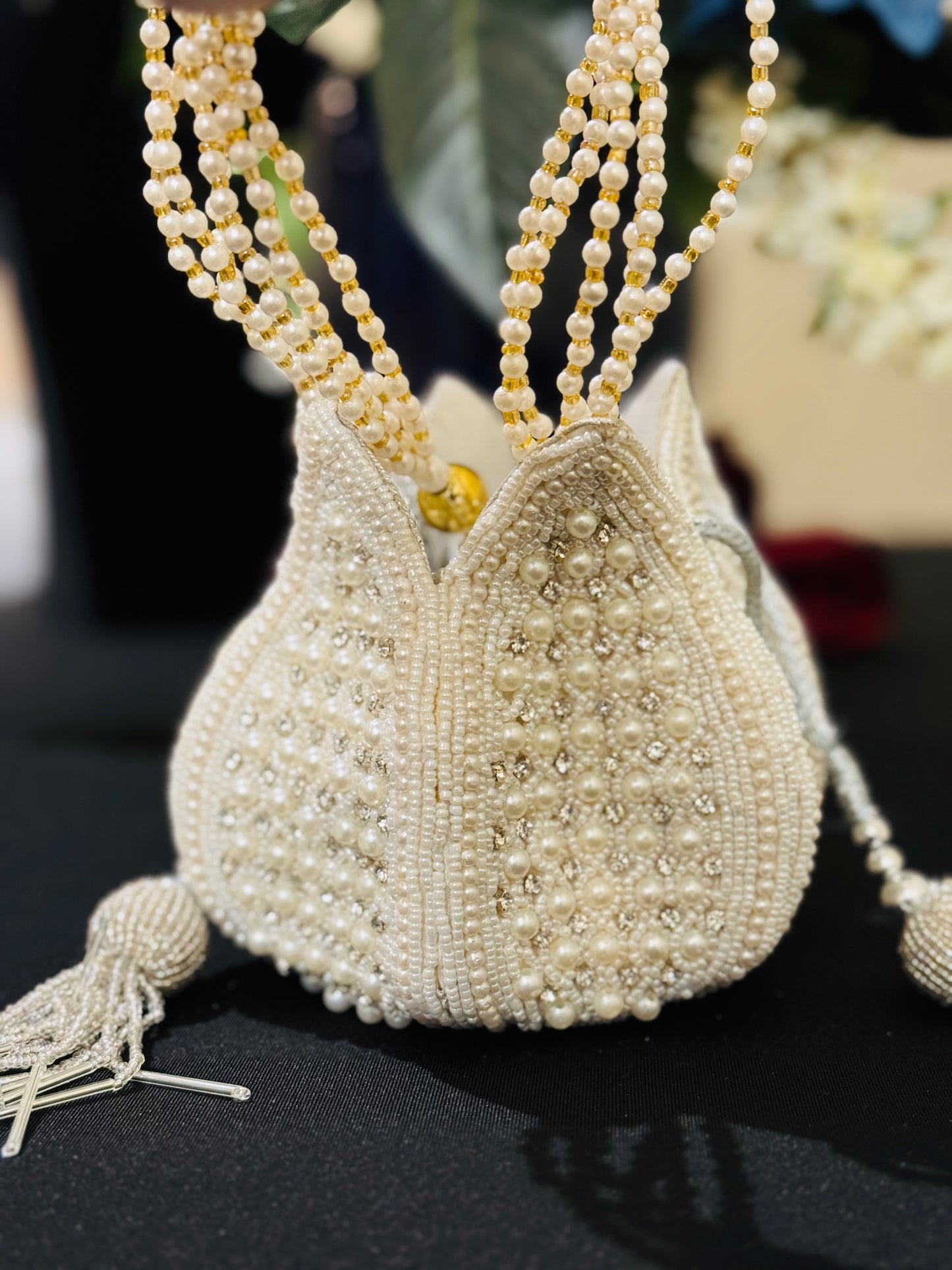 Beautiful white pearl work handmade Potli bag for any occasion