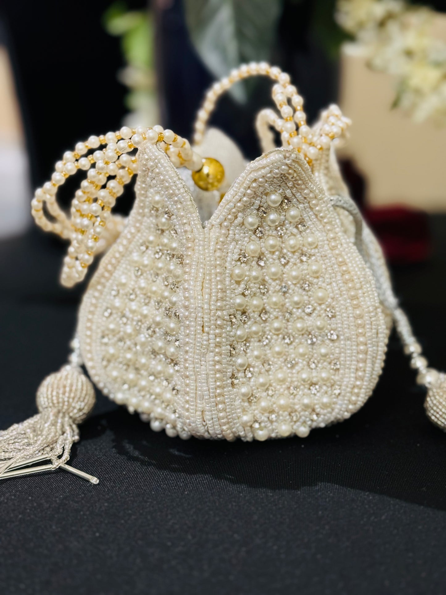 Beautiful white pearl work handmade Potli bag for any occasion