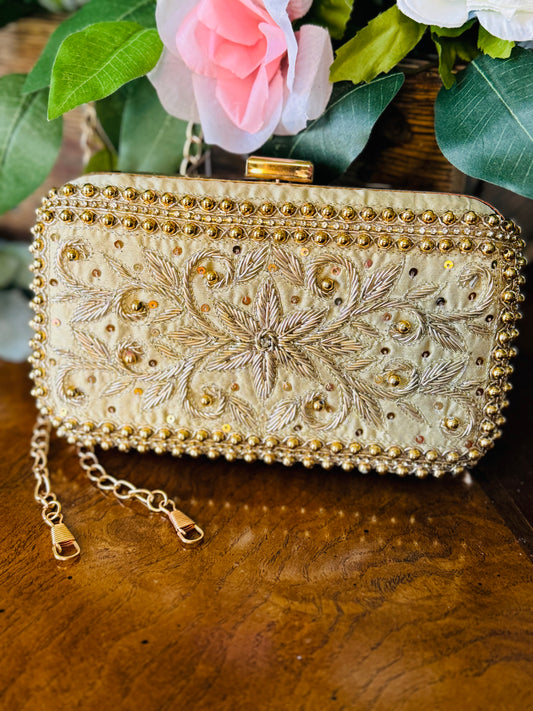 Beautiful handwork clutch for wedding and evening parties in golden