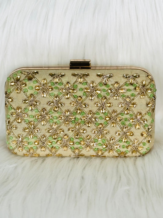 Beautiful embroidery handwork clutch in golden Clutch