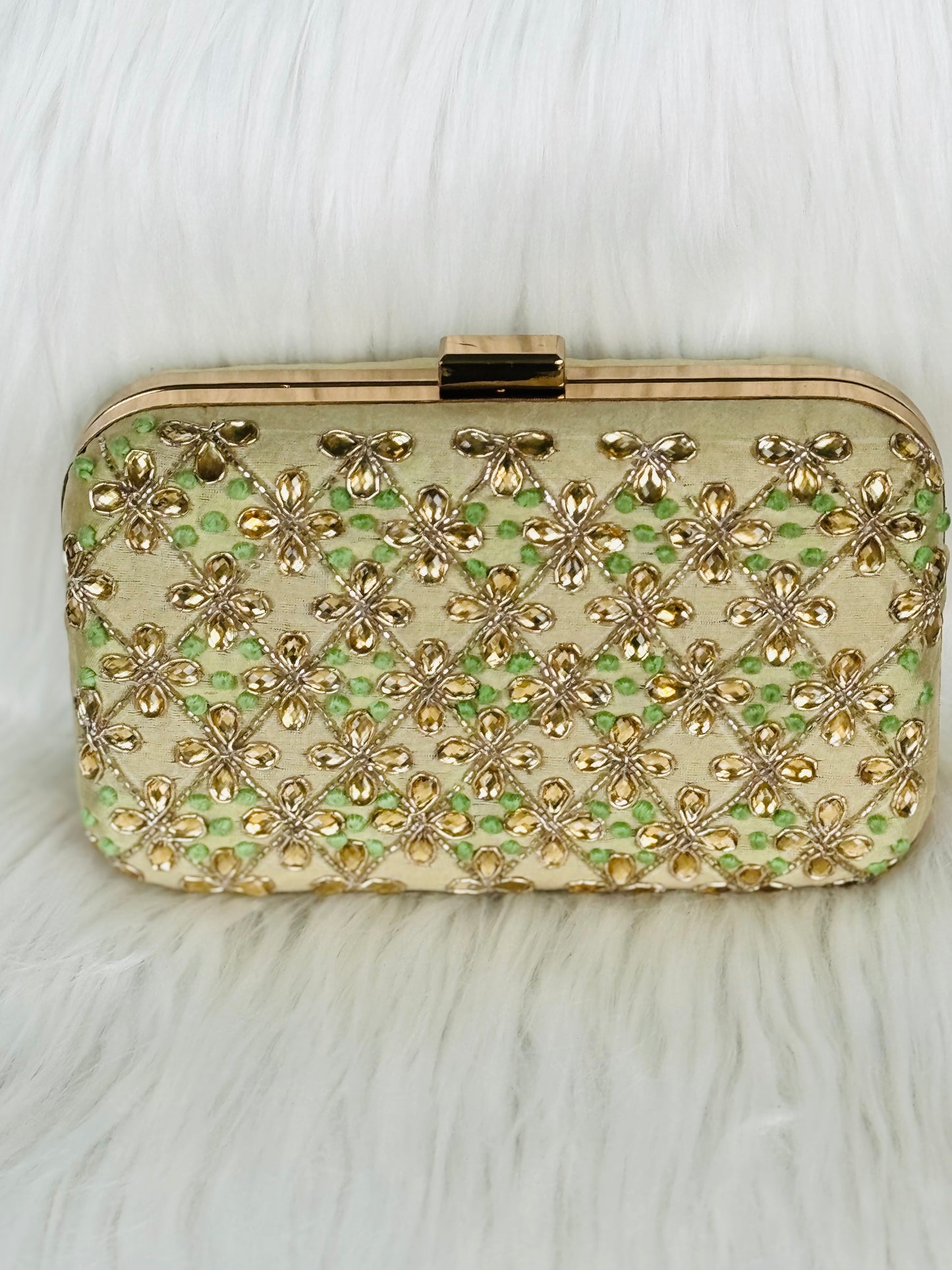 Beautiful embroidery handwork clutch in golden Clutch