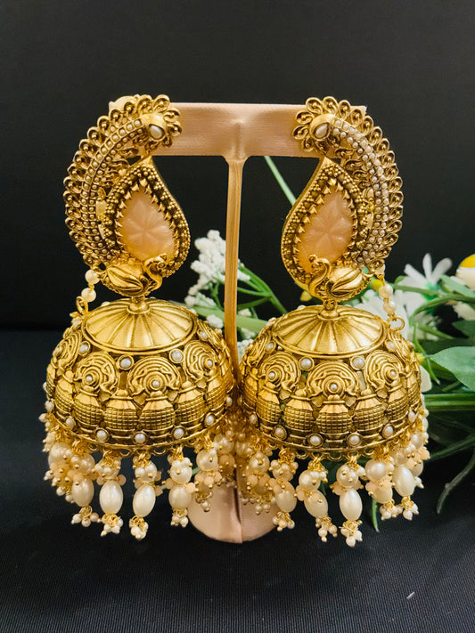 Beautiful antique style jhumka extra large in golden and white pearl jhumka